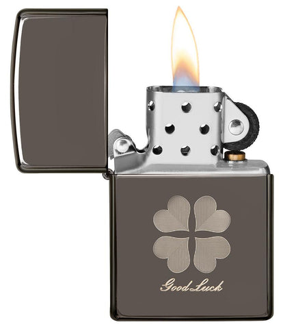 Good Luck Design Black Ice Windproof Lighter with its lid open and lit