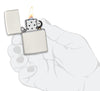 Zapalniczka Zippo Basic Model Glow In The Dark Matt White Otwartym Płomieniem W Stylizowanej Ręce