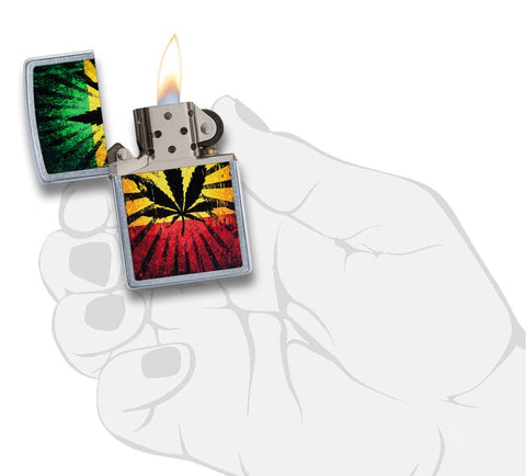  Zapalniczka Zippo chrom z liściem konopi na tle w barwach Jamajki otwarta z płomieniem w stylizowanej dłoni